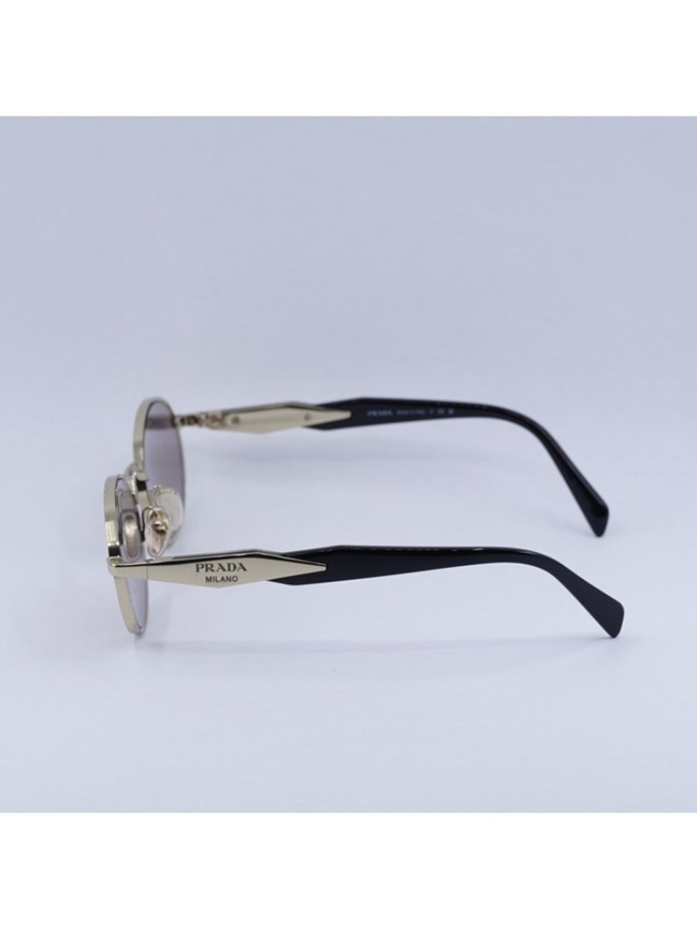 Prada PR65ZS ZVN20I Sunglasses Pale Gold Oval Frame, Light Purple Brown Lenses - Picture 10 of 12